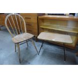 An Ercol Blonde elm and beech Windsor chair and Formica coffee table