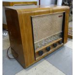A vintage walnut Pye valve radio