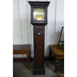 An 18th Century oak 8-day longcase clock, the 12 inch brass dial signed Joseph Calvert * Sold with