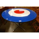 A Pop Art style circular laminated bulls eye table