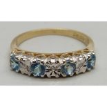 A 9ct gold, blue topaz and diamond ring, 2.7g, P