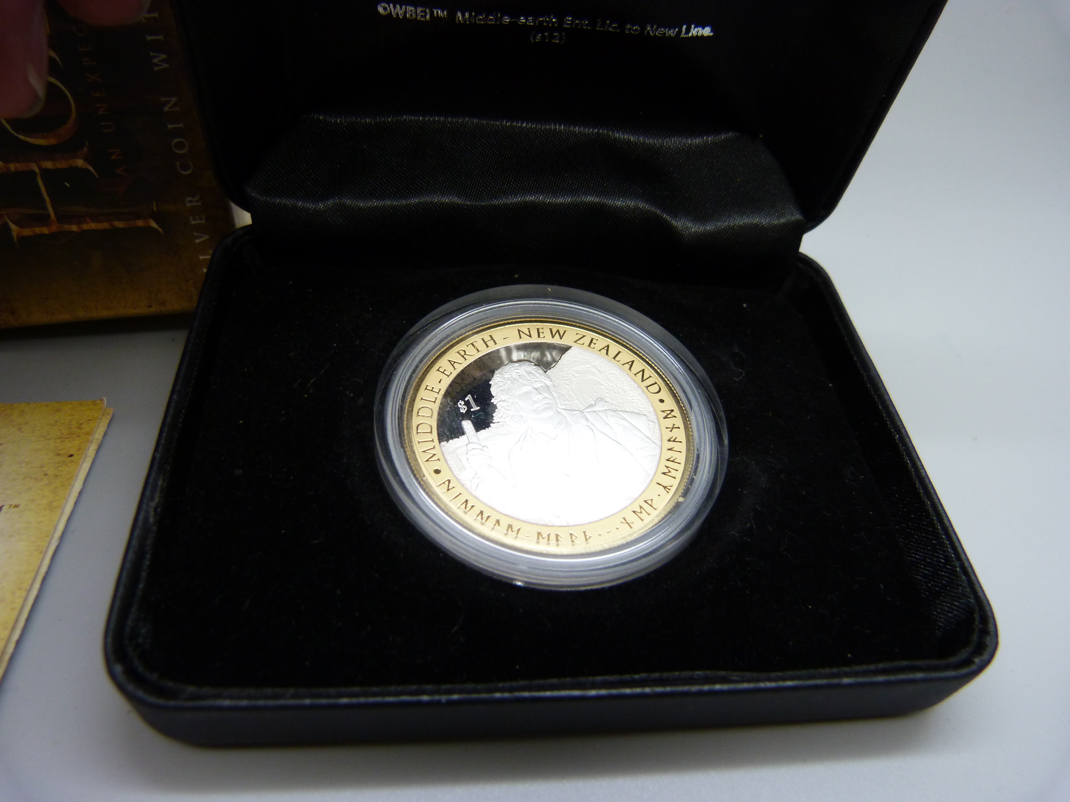 A silver proof The Hobbit 1oz coin, boxed - Image 2 of 2