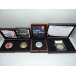 Four £5 proof coins, cased