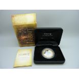 A silver proof The Hobbit 1oz coin, boxed