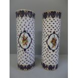 A pair of cylindrical vases, 24cm
