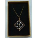 A 9ct gold, pearl and enamel pendant on a 9ct gold chain, 1.7g