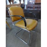 A Bauhaus style tubular steel and leather cantilever armchair