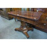 A George IV mahogany fold over games table