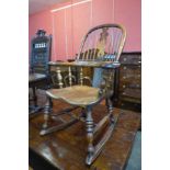 A 19th Century elm and yew wood Windsor rocking chair