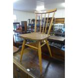 An Ercol Blonde elm and beech 608 model chair