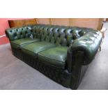 A green leather Chesterfield settee