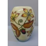 A Moorcroft vase, 13cm, boxed