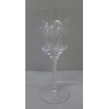 A Masonic glass wine goblet with applied symbols and Courage and Prudence in Latin, monogram to base