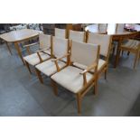 A set of six Danish teak dining chairs