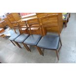 A set of four Nathan teak dining chairs