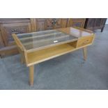 A G-Plan Brandon light oak and glass topped coffee table