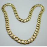 A heavy 9ct gold curb link necklace chain with brushed bark effect to one side and decorative