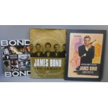 A 'Bond on Bond' limited edition book, signd by Roger Moore plus two other James Bond related books