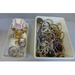 Two tubs of costume jewellery