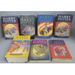 Five Harry Potter 1st Edition novels and two paperbacks