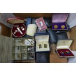 A box of mixed cufflinks