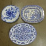 A blue and white early stoneware Willow pattern meat platter with well, a/f, a Thomas Booth blue and