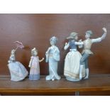 Two Lladro figures including Dancing the Polka, one Nao and one other