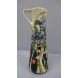 A small Moorcroft jug shaped vase, 18.5cm