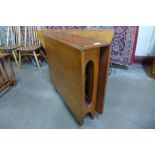 A McIntosh teak drop leaf table