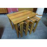 A Poul Hundevad teak and walnut nest of tables