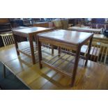 A pair of Danish B.R.D.R. Furbo square teak coffee tables