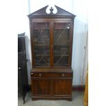 A George IV style mahogany secretaire bookcase