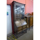 An early 20th Century Jacobean Revival oak bureau bookcase