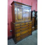 A George III inlaid oak estate or housekeeper's cupboard, 207cms h, 132cms w, 54cms d