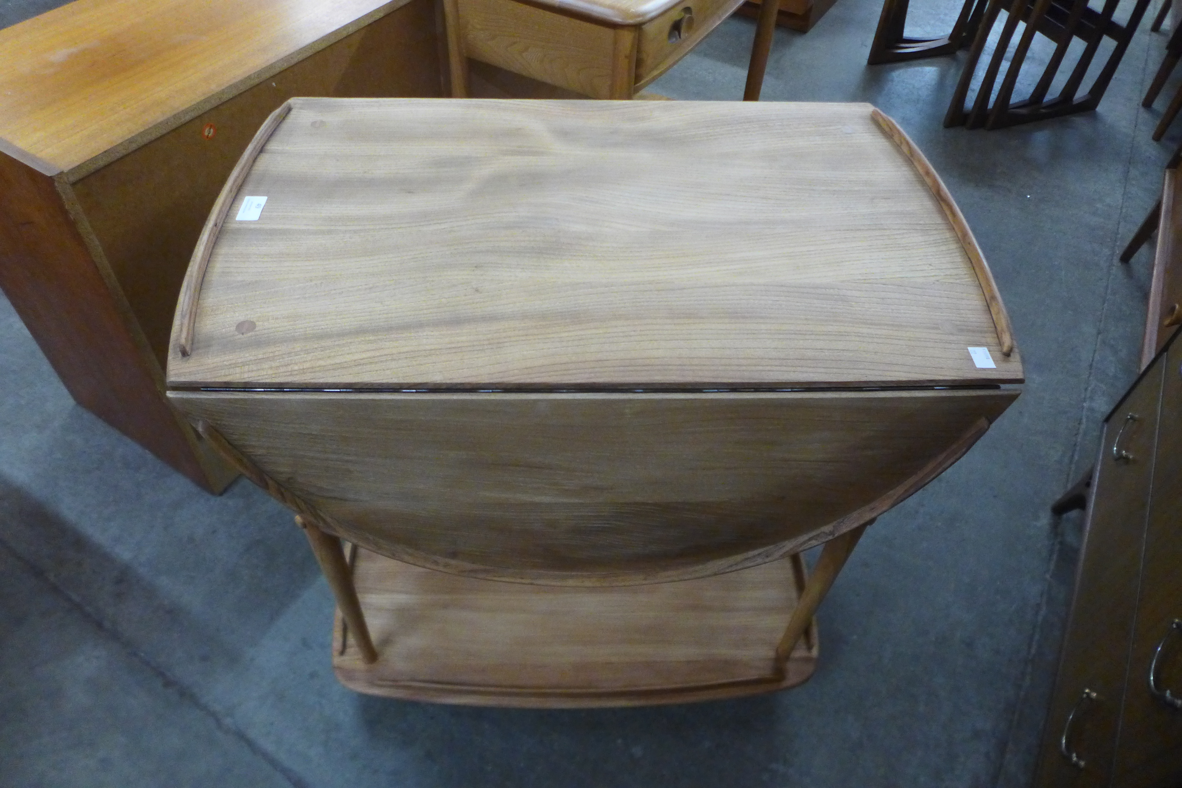 An Ercol elm and beech Windsor drop-leaf trolley - Image 2 of 2