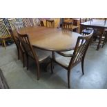 A G-Plan Fresco teak extending dining table and six chairs