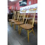 A set of four Ercol Blonde elm and beech Goldsmith chairs