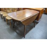 An Ercol elm and beech Windsor drop-leaf table