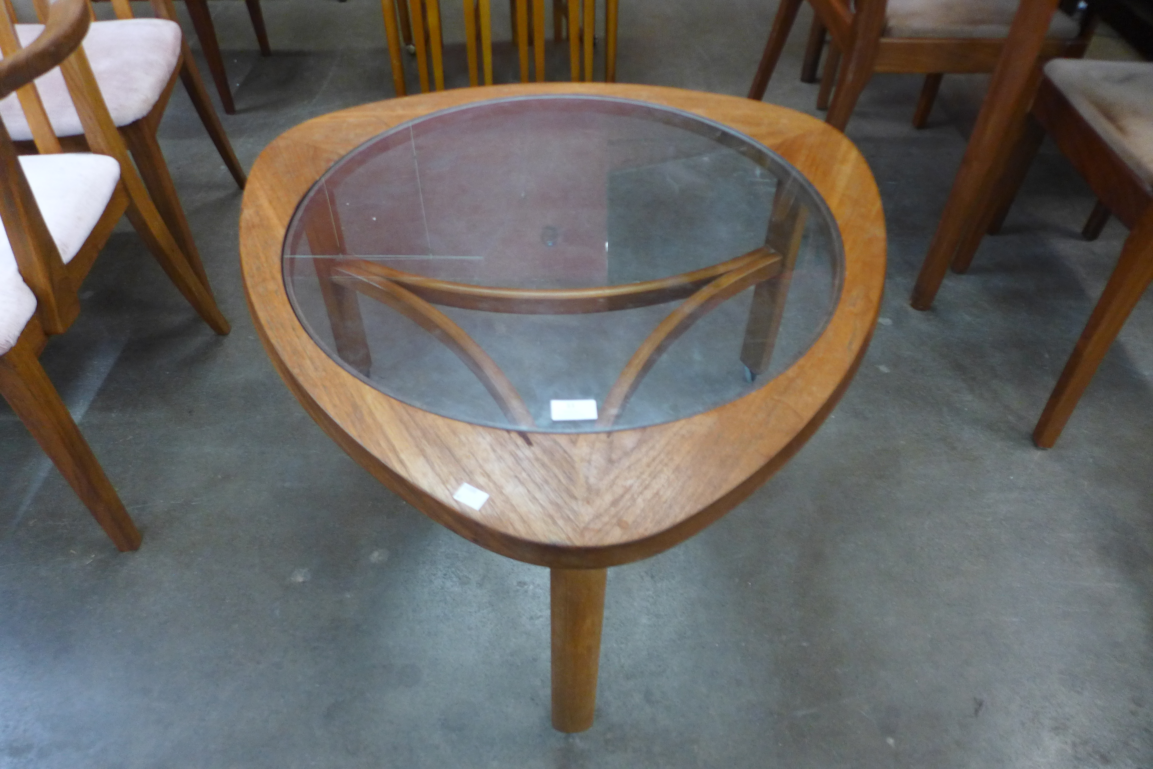 A Nathan teak and glass topped triangular coffee table - Image 2 of 2