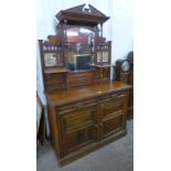 An Edward VII walnut mirrorback sideboard