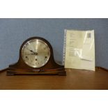 An Art Deco oak mantel clock, the dial signed Walker & Hall