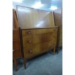 A teak and walnut bureau