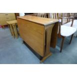 A G-Plan Fresco teak drop-leaf table