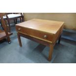 A Greaves & Thomas teak single drawer side table