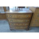 A George III style burr walnut bow front chest of drawers