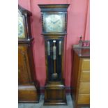 An early 20th Century oak triple weight longcase clock