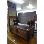 A miniature carved mahogany monks bench