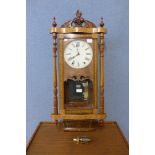 A 19th Century American inlaid walnut wall clock