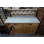 An Edward VII birch and marble topped washstand