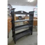 An Arts and Crafts oak open bookcase